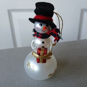 The Bon Marche Snowman with a Gift Ornament 4" winter holiday christmas hanukkah